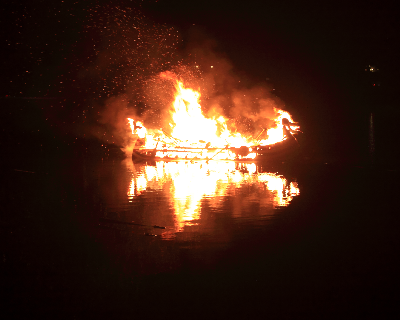 Barden burning on the water