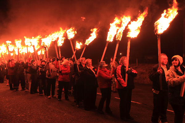 Procession of lit torches