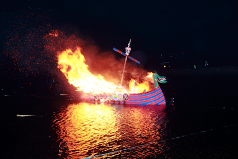 Galley Flada burning on the  water