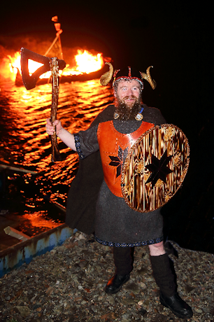 The Jarl in front of his blazing galley