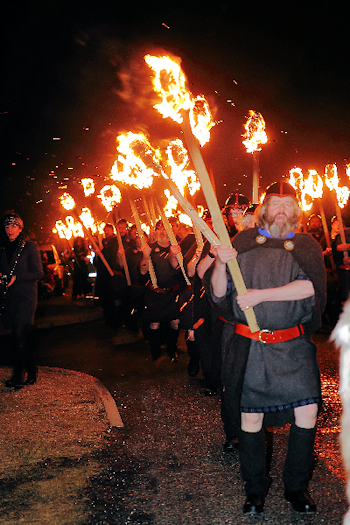 Guisers marching in the procession